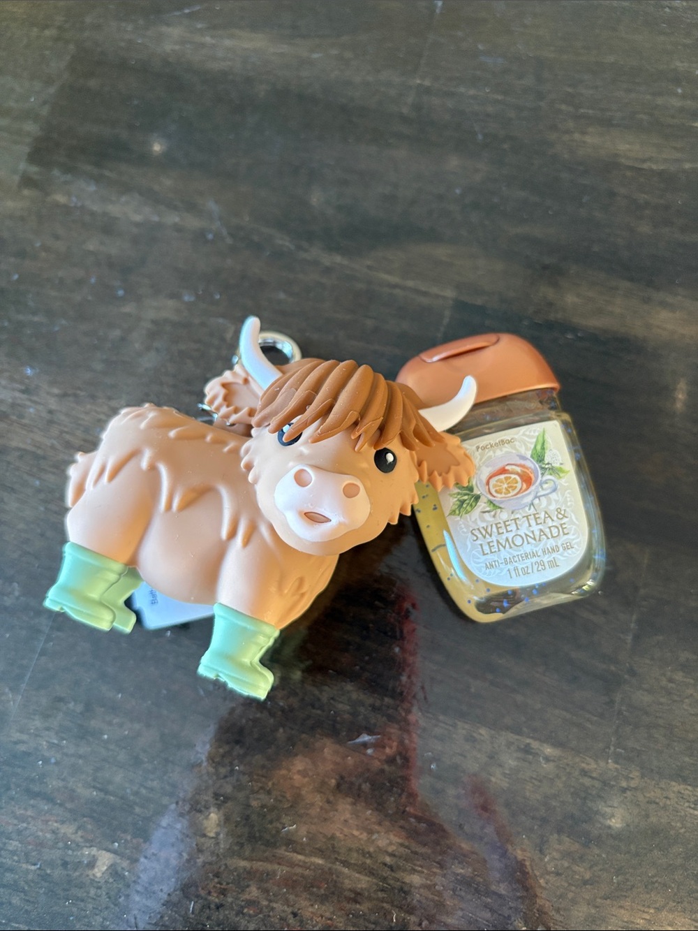 Bath & Body Cute Highland Cow Hand Sanitizer Holder in Tan & Green